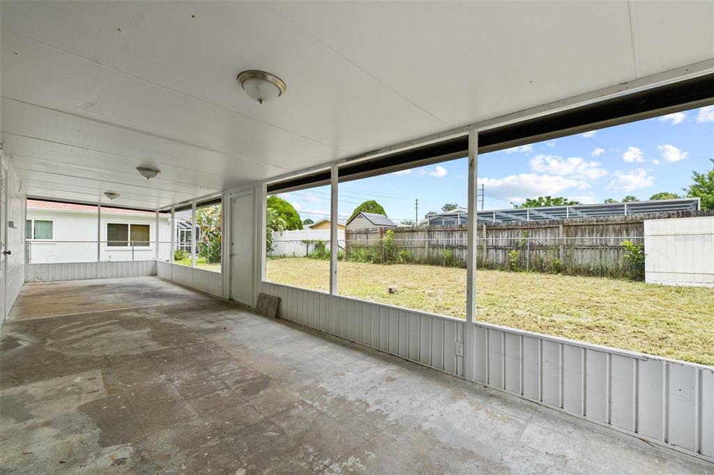 8046 Norwich Drive Port Richey, FL 34668 - Photo 24 of 31 a view of an empty room with a large window with outer view