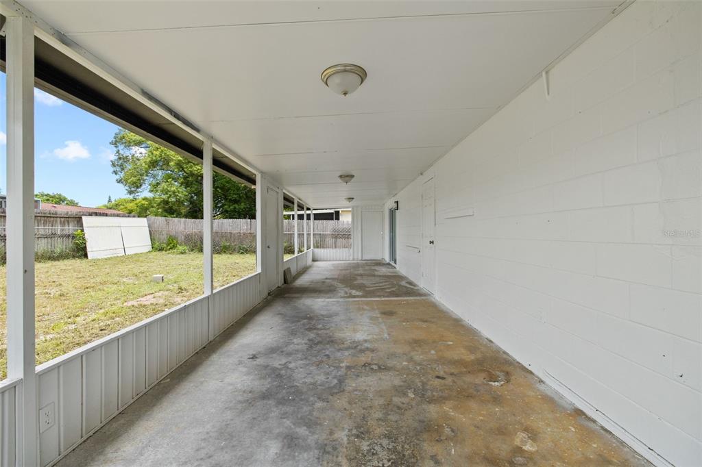 8046 Norwich Drive Port Richey, FL 34668 - Photo 26 of 31 a view of outdoor space with seating area