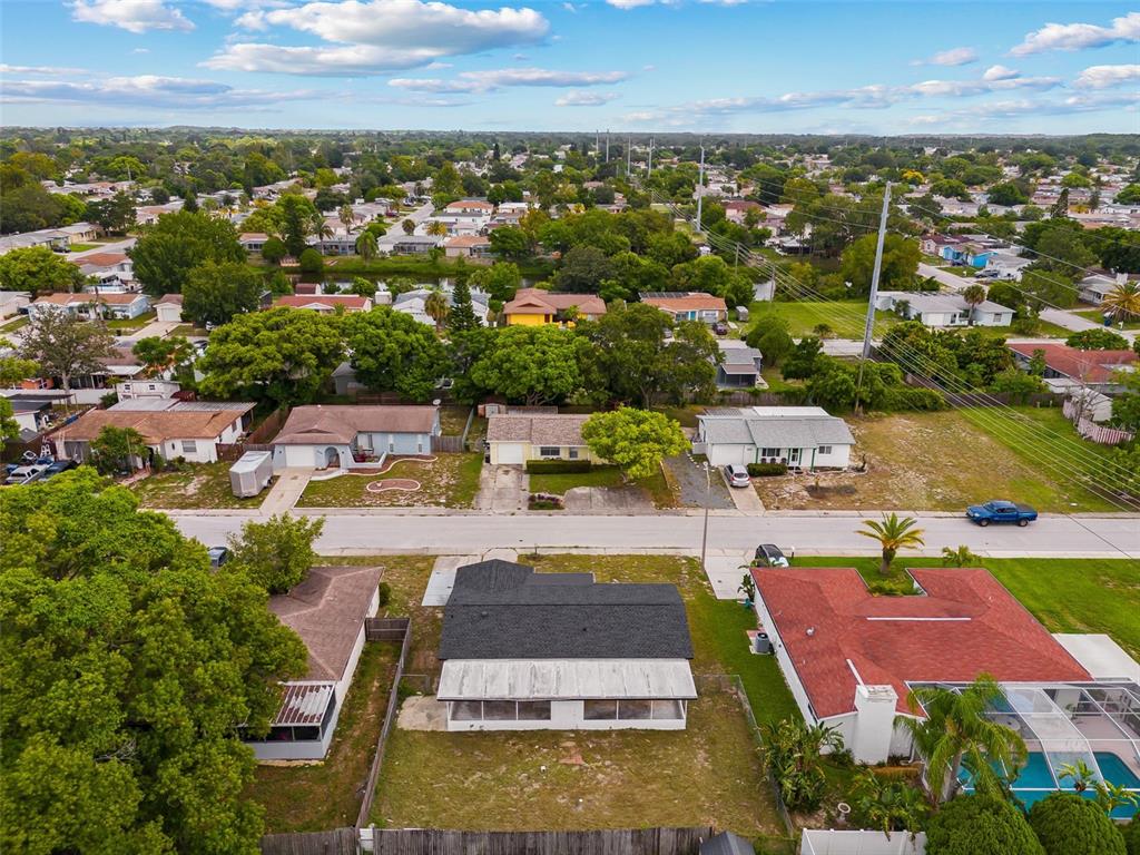 8046 Norwich Drive Port Richey, FL 34668 - Photo 29 of 31 an aerial view of residential houses with outdoor space