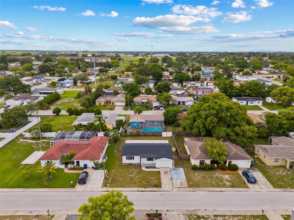 8046 Norwich Drive Port Richey, FL 34668 - Photo 30 of 31 an aerial view of residential houses with outdoor space