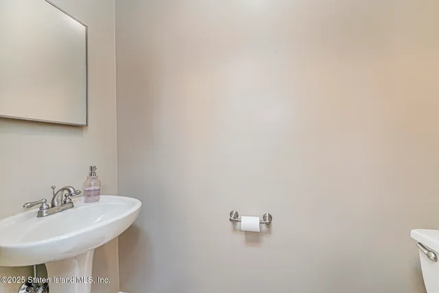 a bathroom with a sink and a toilet