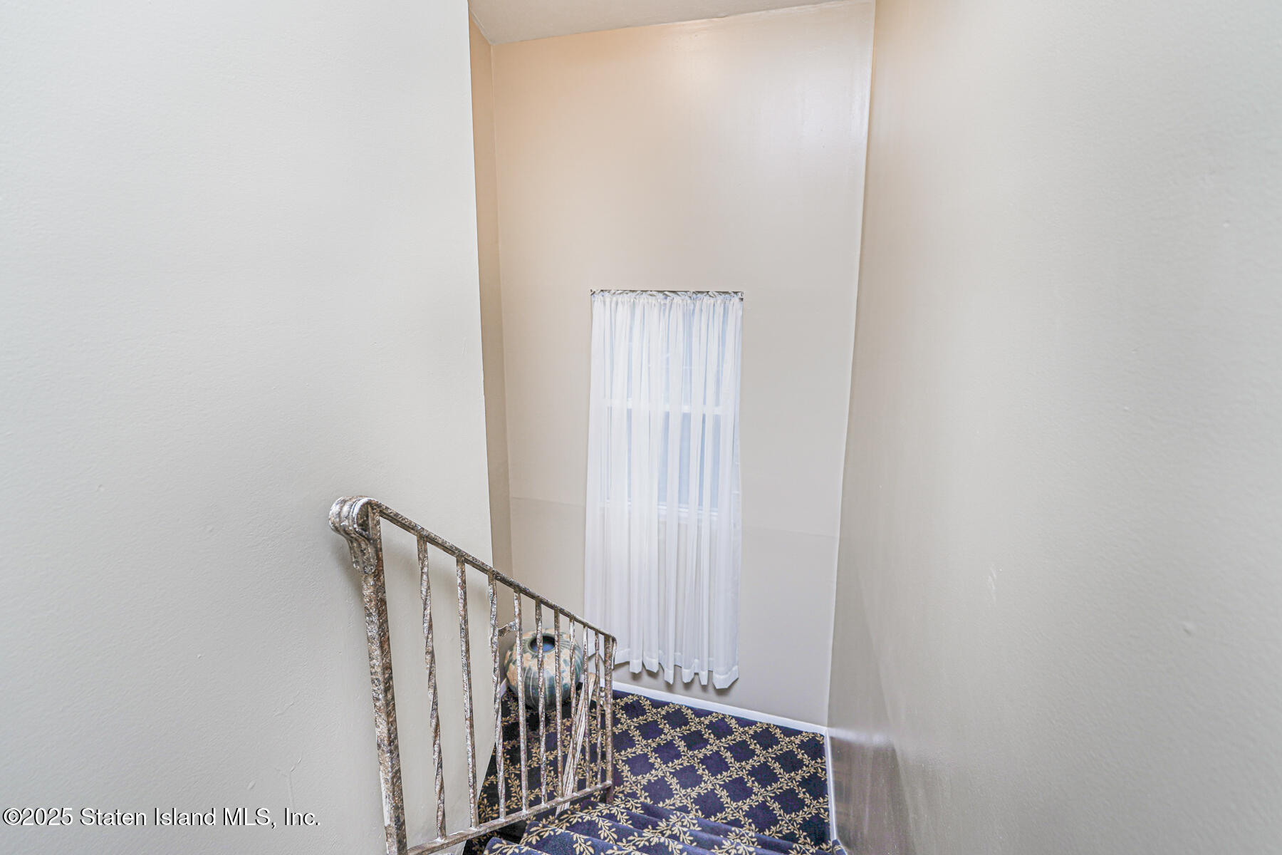 342 Chelsea Street Staten Island, NY 10307 - Photo 15 of 35 a view of a hallway with wooden floor and entryway