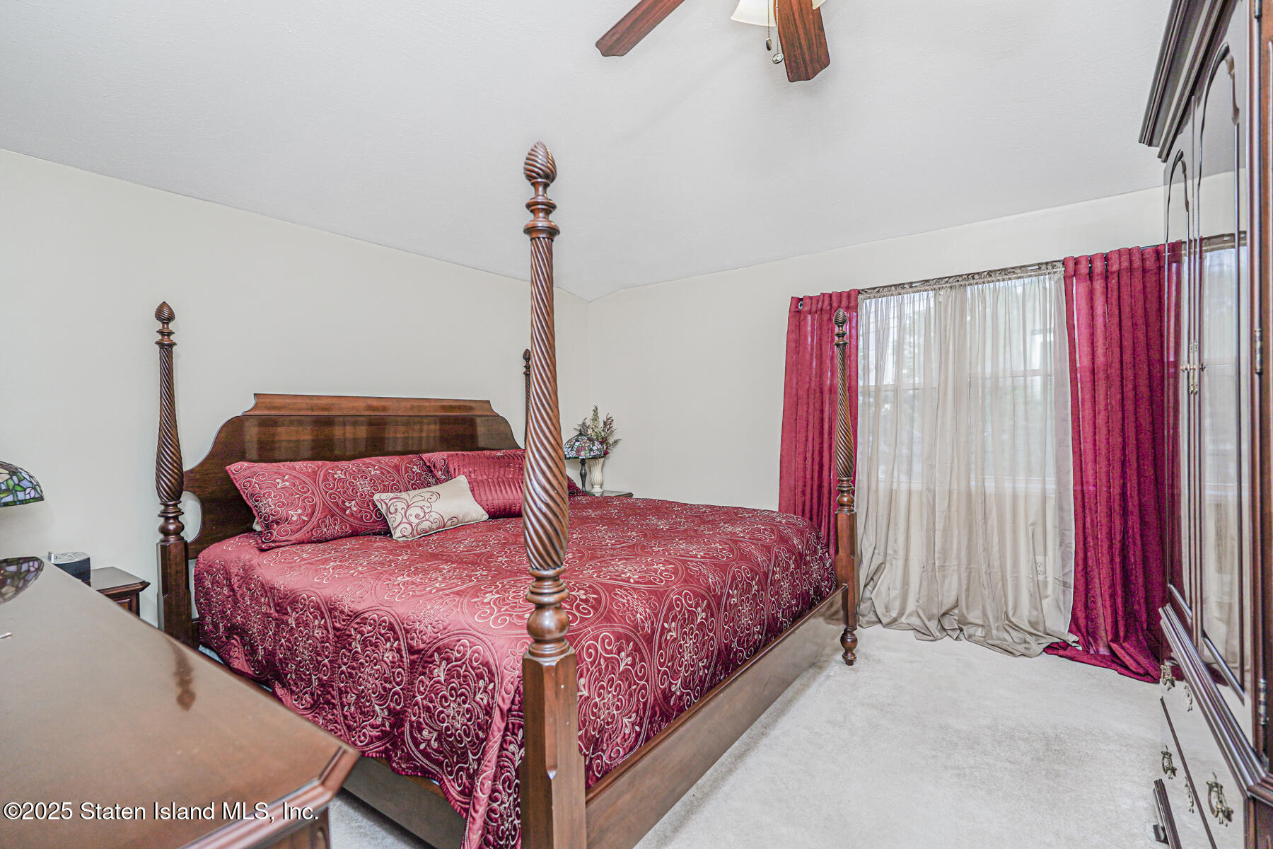 342 Chelsea Street Staten Island, NY 10307 - Photo 16 of 35 a bedroom with a bed and window