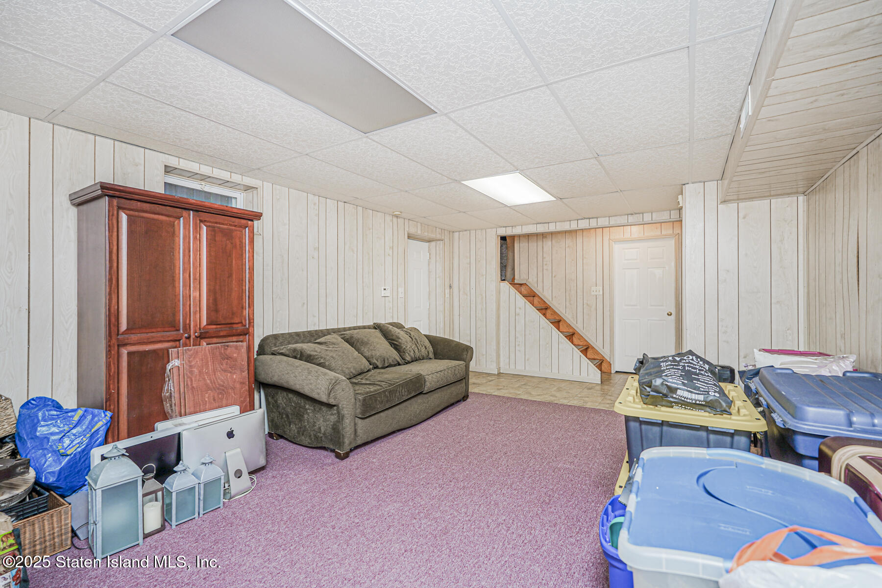 342 Chelsea Street Staten Island, NY 10307 - Photo 24 of 35 a living room with furniture and a wooden floor