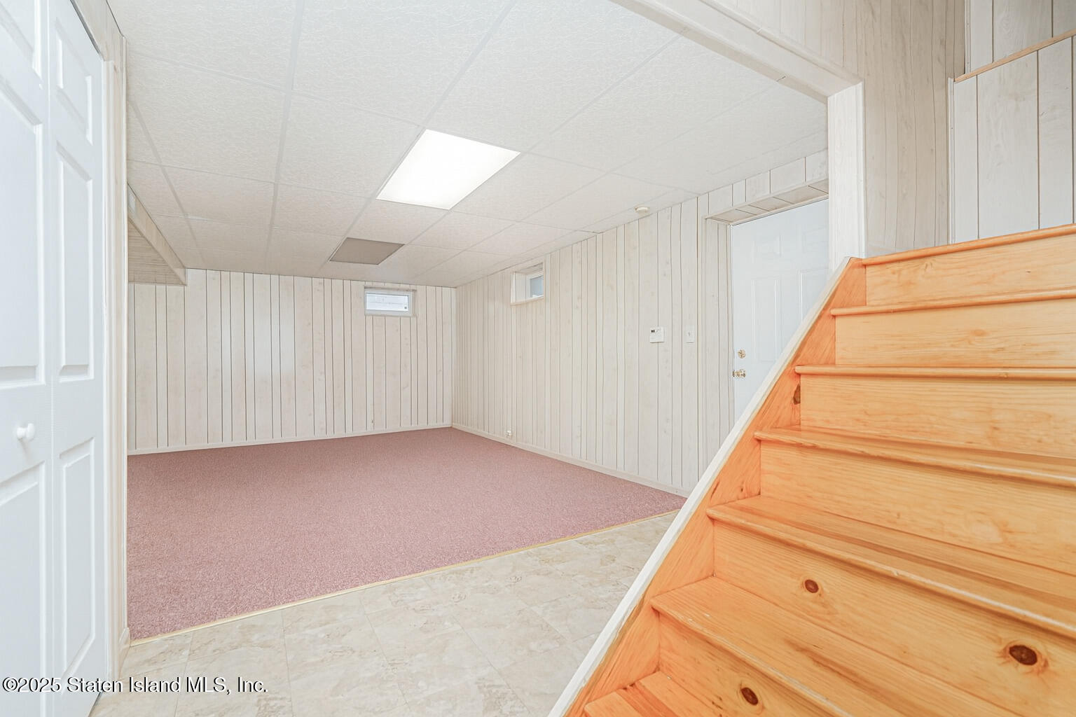 342 Chelsea Street Staten Island, NY 10307 - Photo 26 of 35 a view of an empty room with stairs