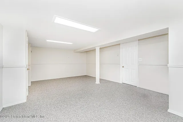 a view of a storage & utility room with racks