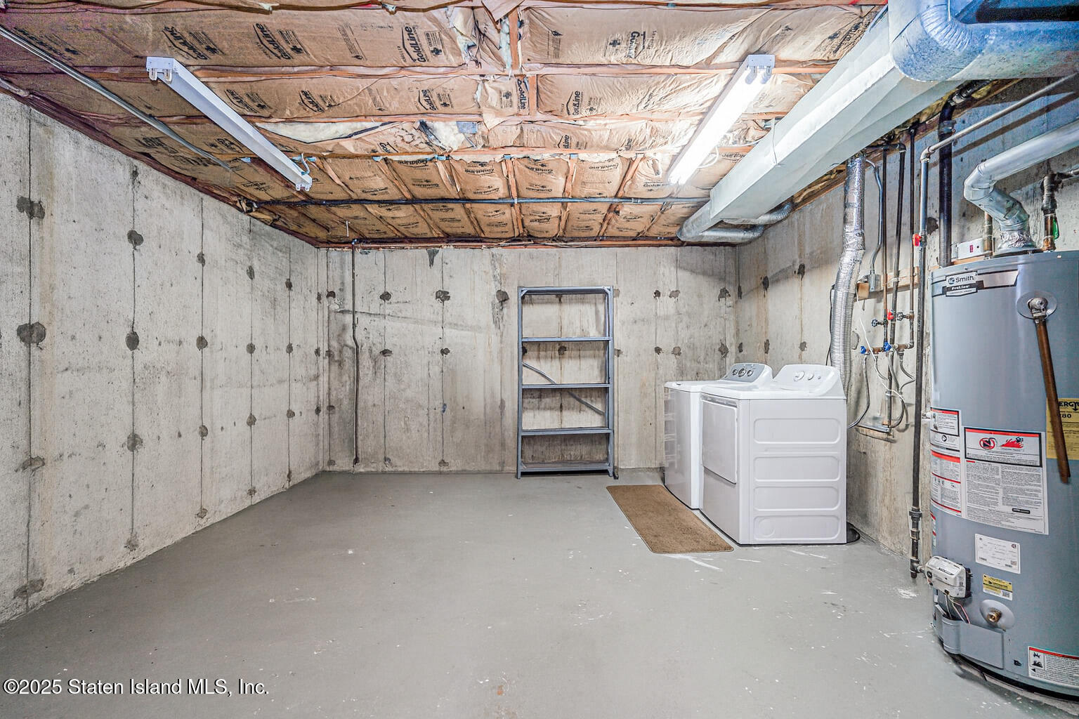342 Chelsea Street Staten Island, NY 10307 - Photo 30 of 35 a view of a storage & utility room with racks