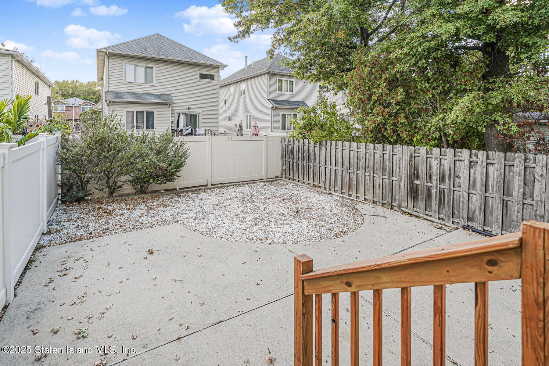 342 Chelsea Street Staten Island, NY 10307 - Photo 33 of 35 a view of a house with wooden fence