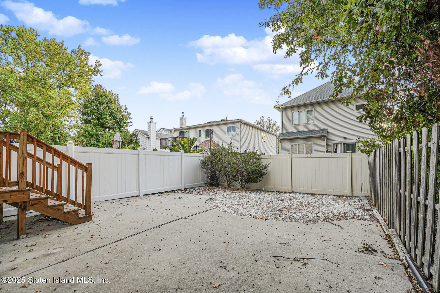 342 Chelsea Street Staten Island, NY 10307 - Photo 34 of 35 a white house that has tree in front of it