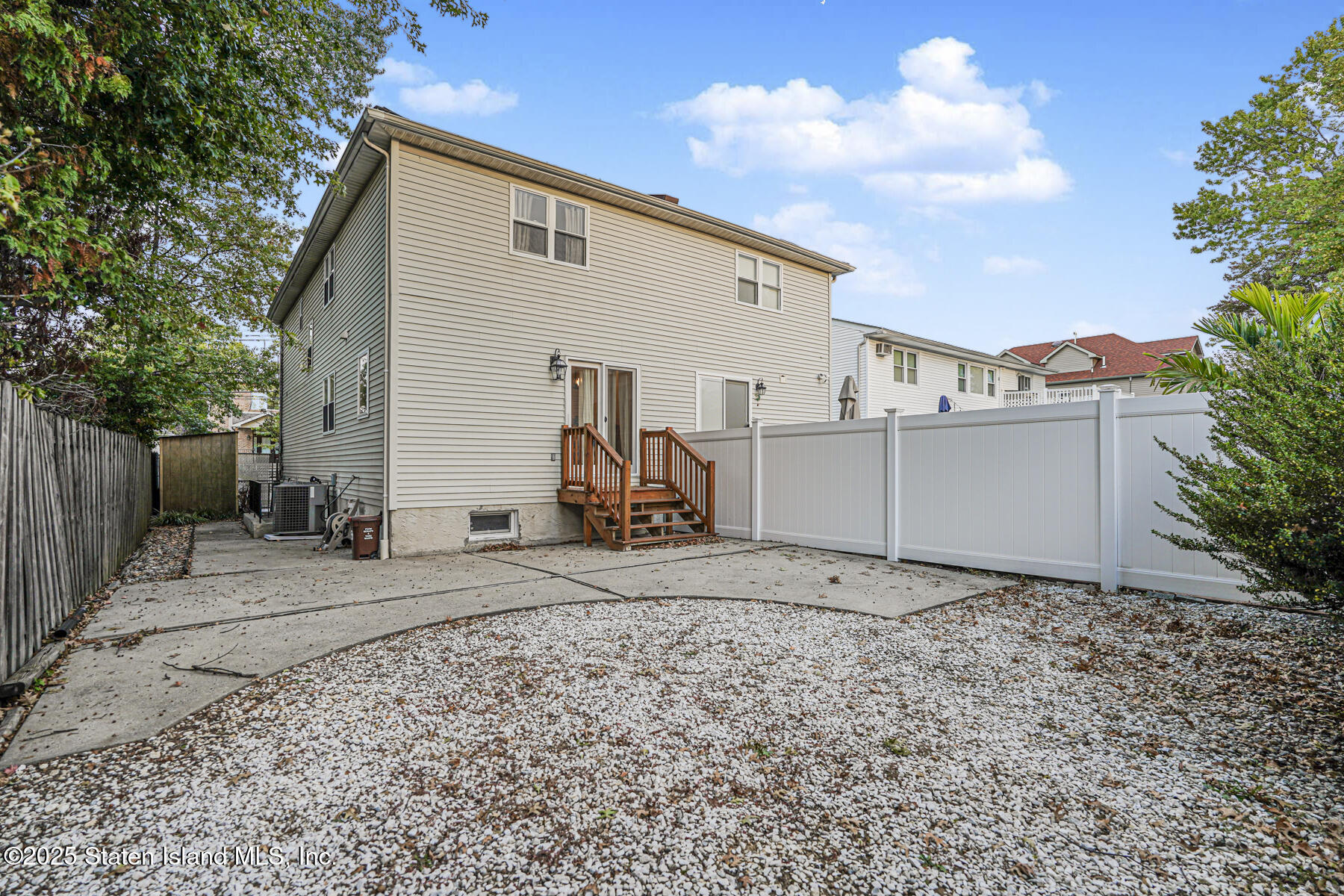 342 Chelsea Street Staten Island, NY 10307 - Photo 35 of 35 a view of a white house with a yard