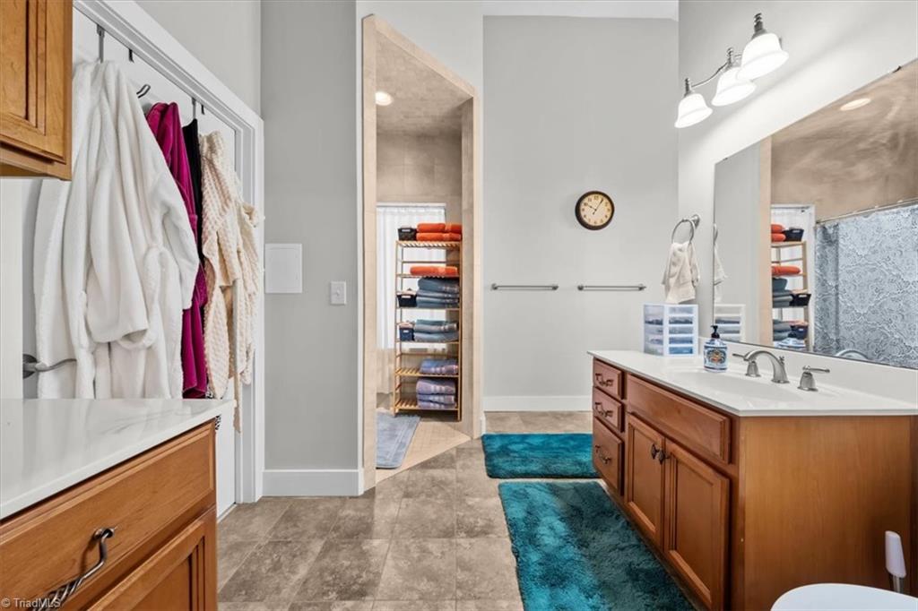 2207 Sierra Trace Road Denton, NC 27239 - Photo 24 of 49 Well-appointed primary bath with dual vanity, tiled shower, Tub and generous storage