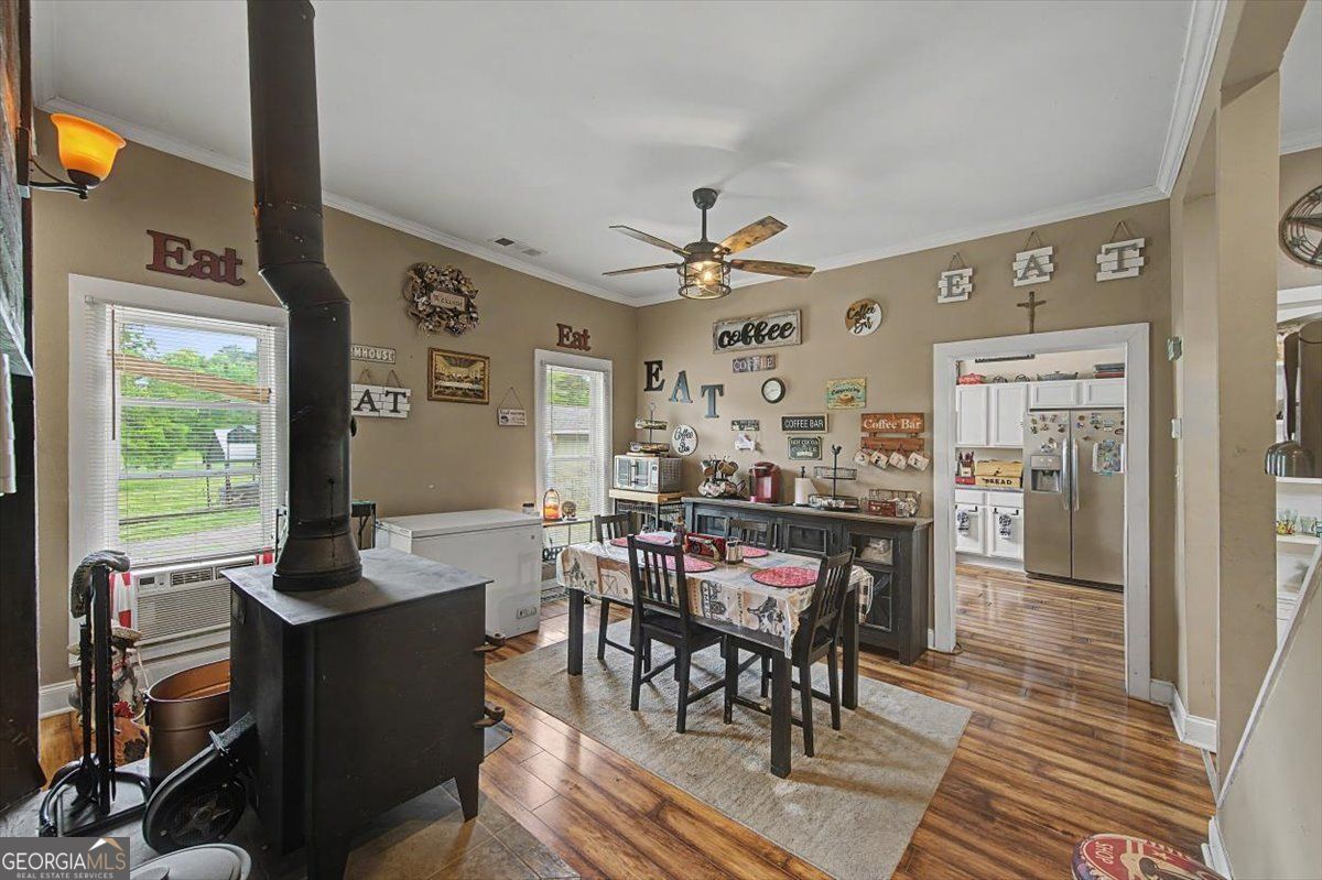 483 Coal Road Northwest Resaca, GA 30735 - Photo 15 of 56 a dining room with furniture and window