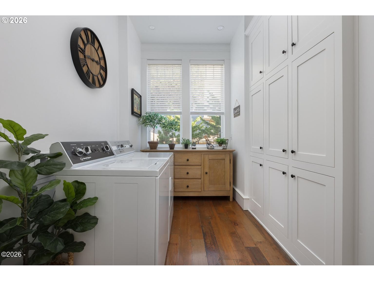 520 Cove Point Depoe Bay, OR 97341 - Photo 29 of 43 a view of washer and dryer with kitchen view