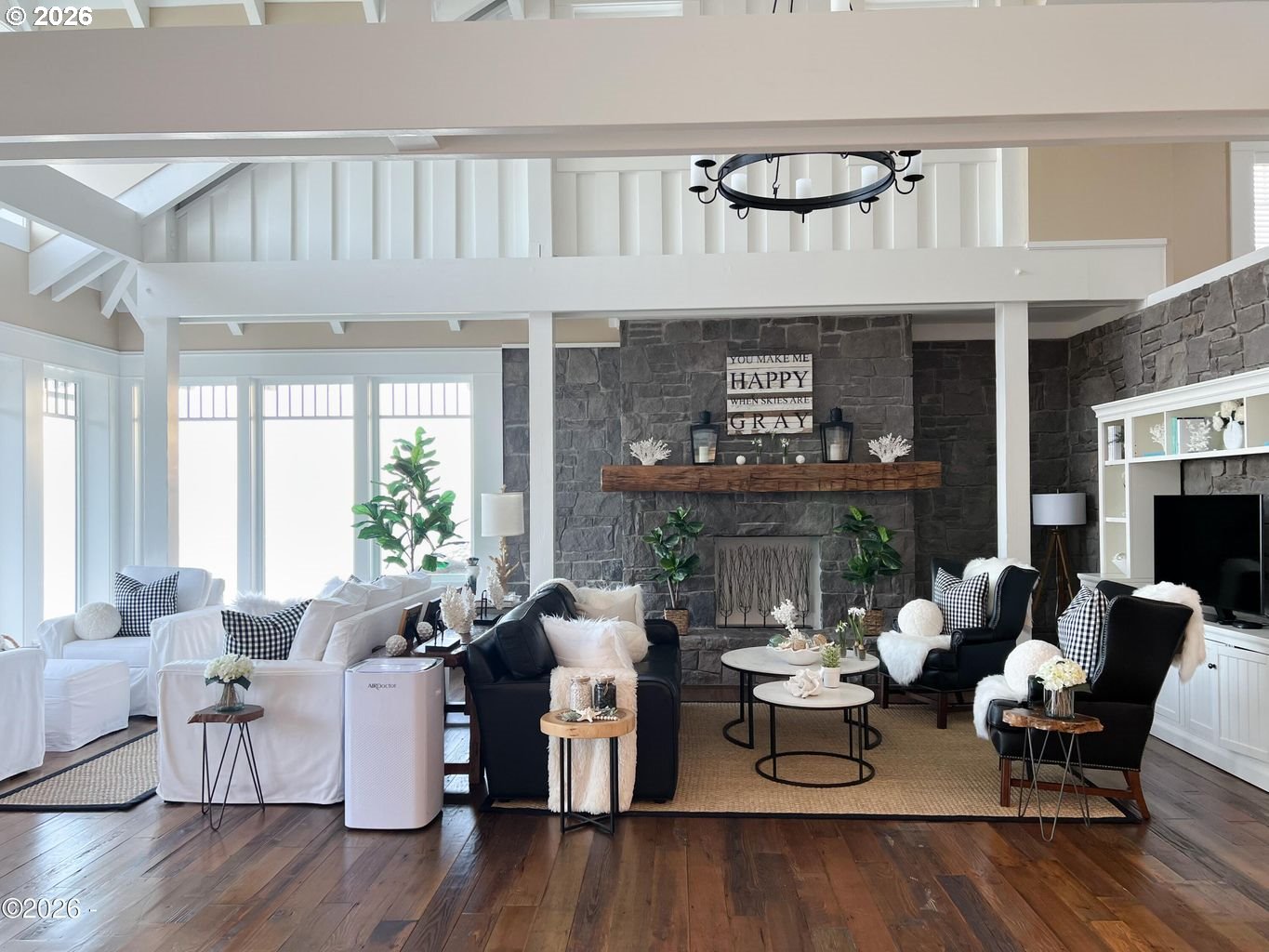 520 Cove Point Depoe Bay, OR 97341 - Photo 6 of 43 a living room with furniture a fireplace and a large window