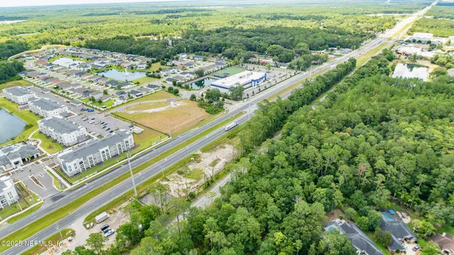a view of an swimming pool with a yard