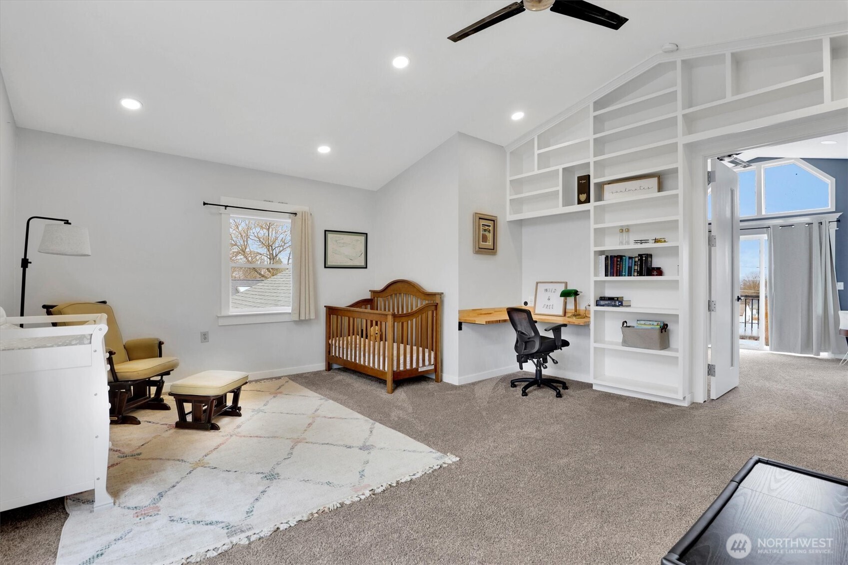 2819 West Olympic Avenue Spokane, WA 99205 - Photo 17 of 40 a room with furniture a air conditioner and a window