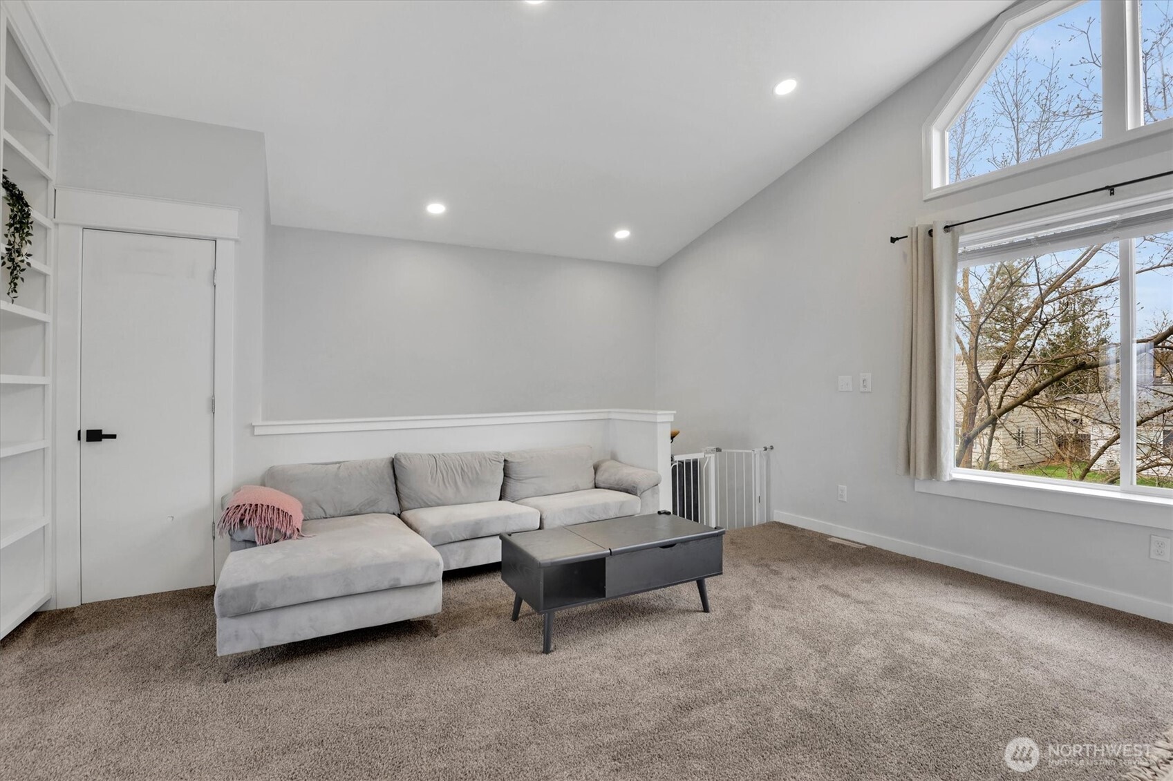 2819 West Olympic Avenue Spokane, WA 99205 - Photo 19 of 40 a living room with furniture and a window