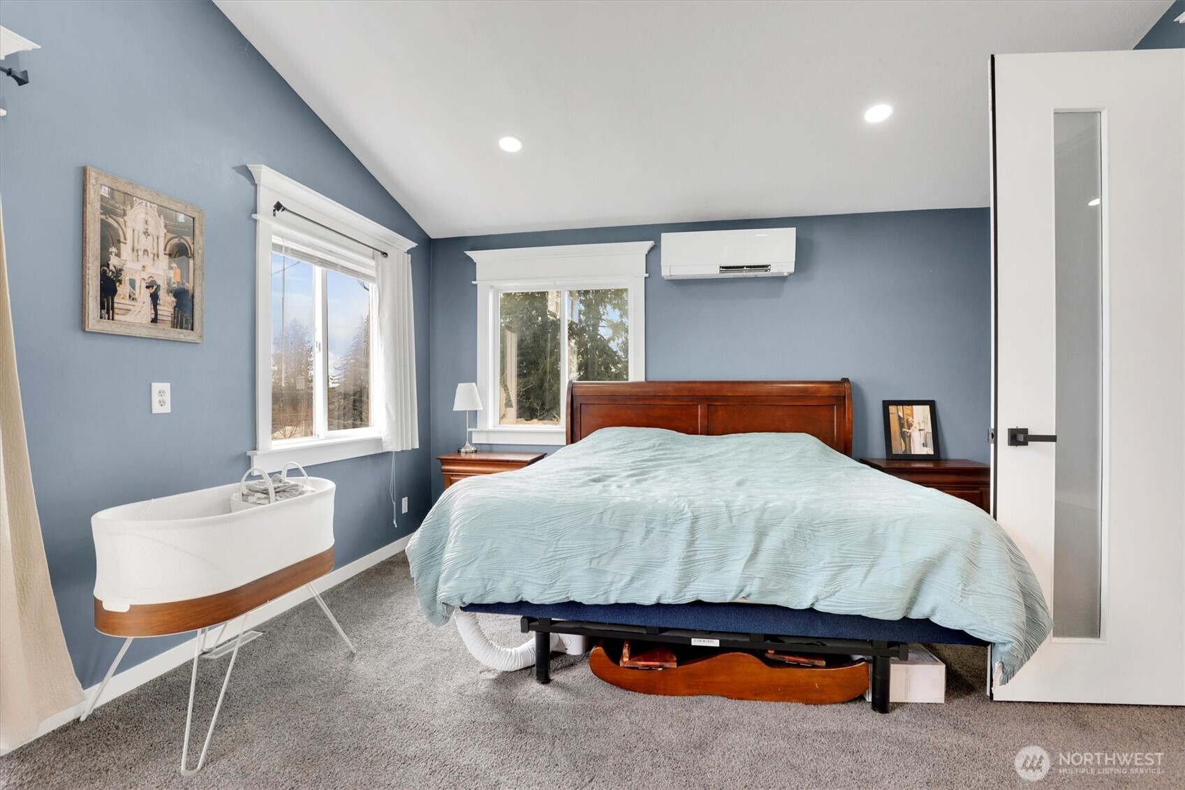 2819 West Olympic Avenue Spokane, WA 99205 - Photo 20 of 40 a bedroom with a bed and window