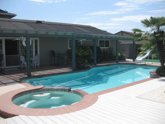 13318 Tobiasson Road Poway, CA 92064 - Photo 15 of 21 Another nice feature is the jacuzzi being a part of the pool. If you get too warm in the jacuzzi it's easy to cool off.