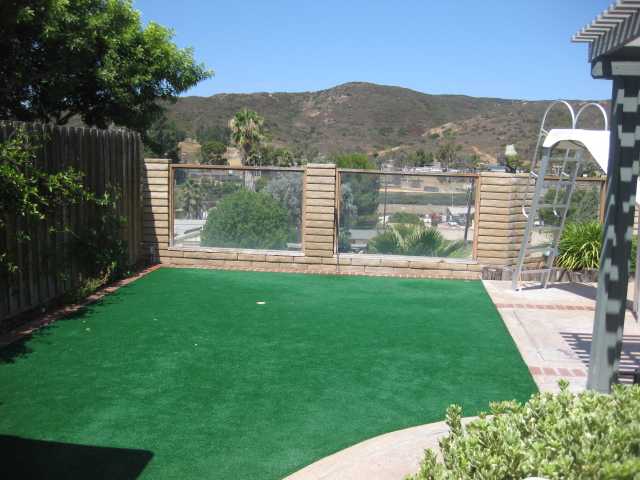 13318 Tobiasson Road Poway, CA 92064 - Photo 18 of 21 Did you ever think you'd own a home with a private putting green? And beyond the glass block wall is a slope complete with sprinklers and healthy Lime, Blood Orange, Lemon, Peach and Avocado trees. Say goodbye to Henry's Marketplace...