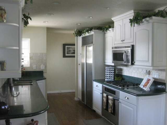 13318 Tobiasson Road Poway, CA 92064 - Photo 3 of 21 The Galley Kitchen features top quality stainless steel appliances from SubZero, Bosch and Thermador and lots of cabinet/pantry space.