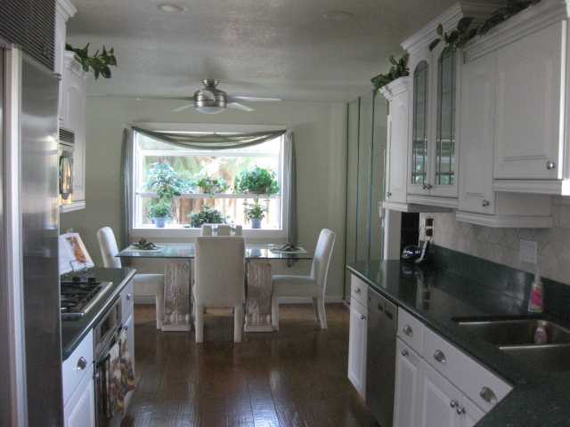 13318 Tobiasson Road Poway, CA 92064 - Photo 5 of 21 Yes, that is real hardwood flooring. No laminate in this house!