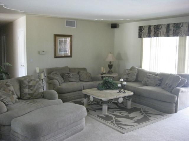 13318 Tobiasson Road Poway, CA 92064 - Photo 6 of 21 The spacious living room is the perfect spot to unwind after a long day at the office.