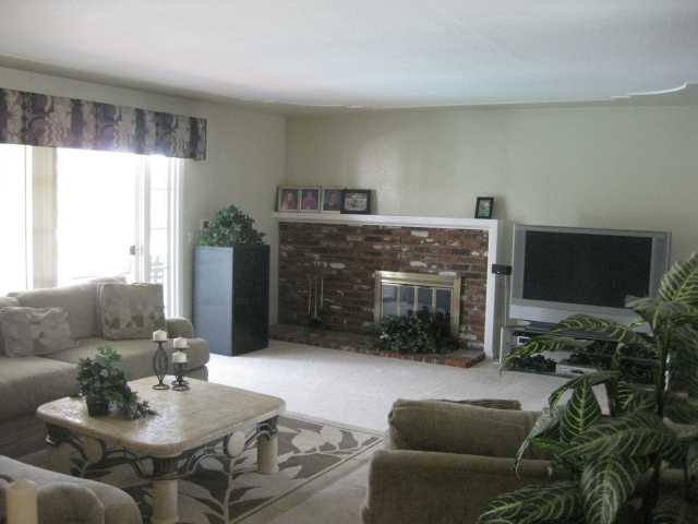 13318 Tobiasson Road Poway, CA 92064 - Photo 8 of 21 And when winter does arrive you can always cuddle up to the gas/woodburning fireplace and enjoy time with friends and family.