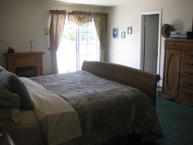 13318 Tobiasson Road Poway, CA 92064 - Photo 9 of 21 You're in luck! This home features two master bedroom suites. This one is upstairs and even has its own private balcony.