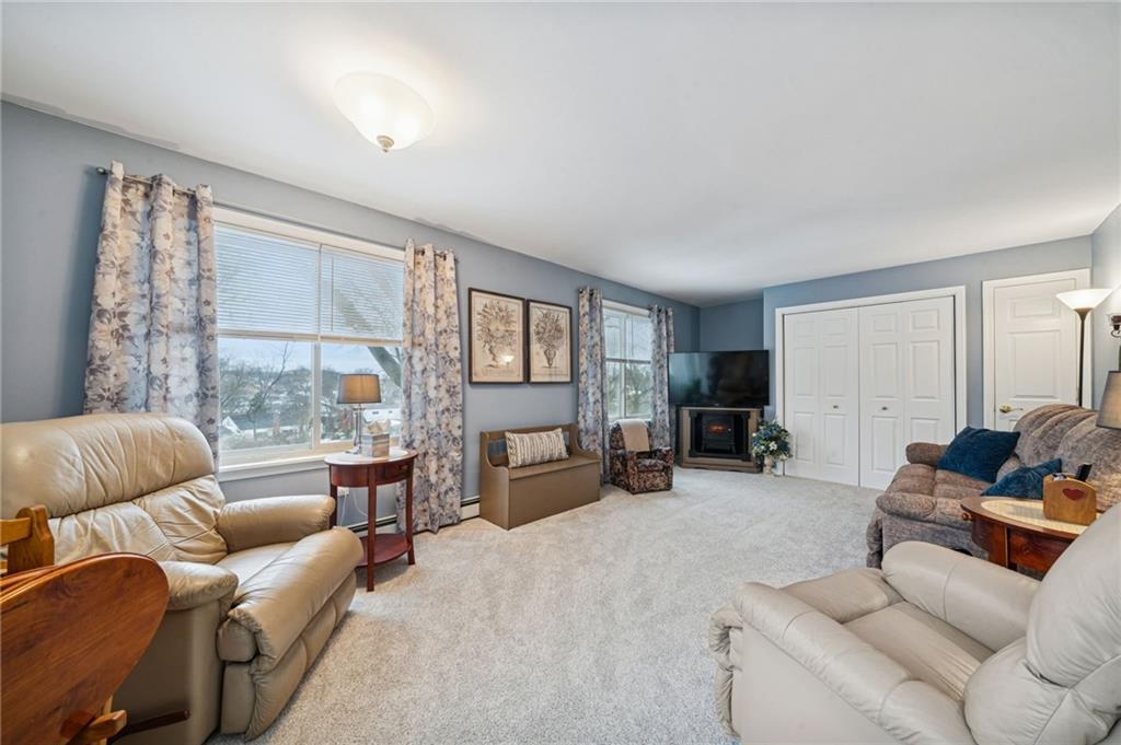 31 Locust Lane Pittsburgh, PA 15241 - Photo 17 of 35 a living room with furniture and a large window
