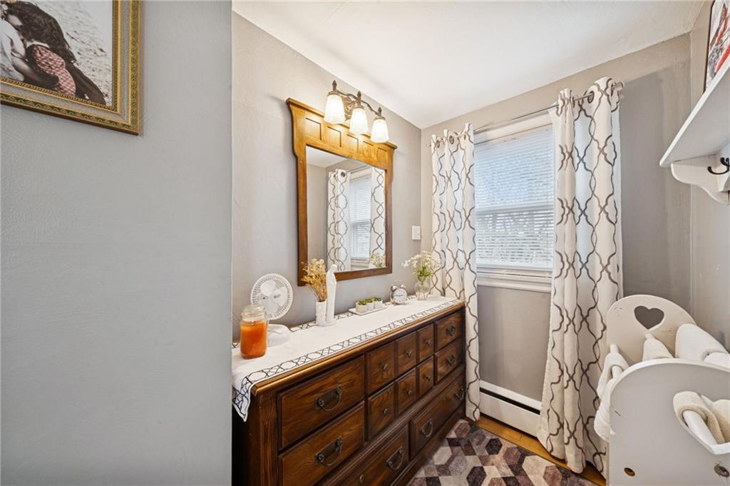31 Locust Lane Pittsburgh, PA 15241 - Photo 22 of 35 a bathroom with a granite countertop sink a large mirror and a bathtub