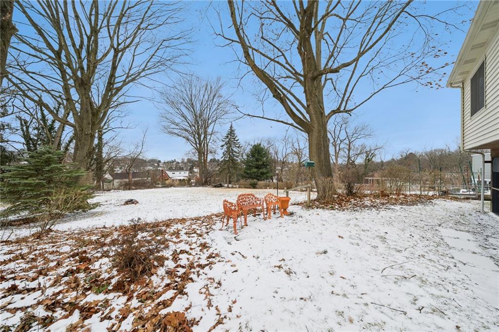31 Locust Lane Pittsburgh, PA 15241 - Photo 30 of 35 a view of a yard covered with snow in front of house