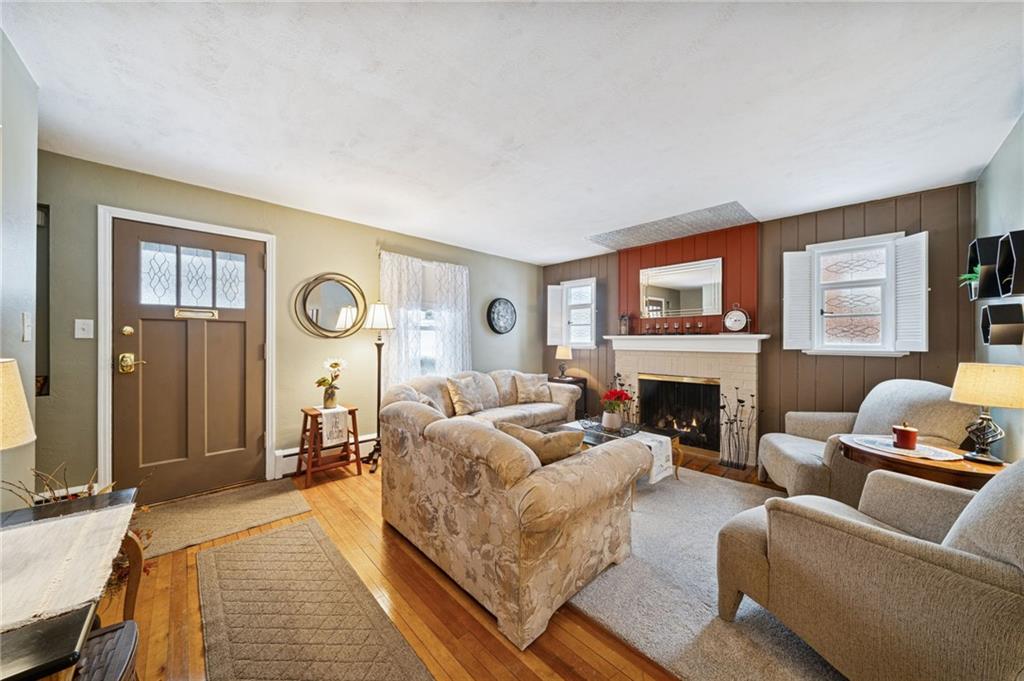 31 Locust Lane Pittsburgh, PA 15241 - Photo 3 of 35 a living room with furniture and a fireplace