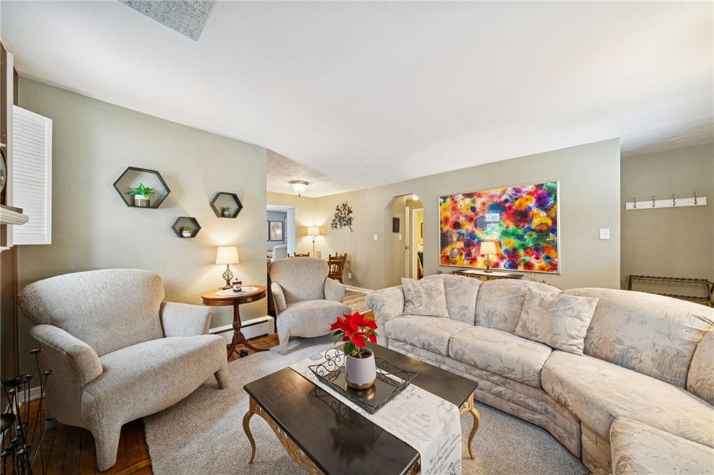 31 Locust Lane Pittsburgh, PA 15241 - Photo 4 of 35 a living room with furniture and a couch