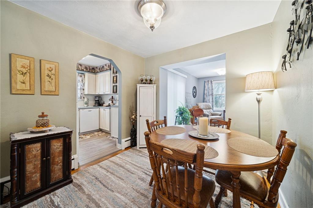 31 Locust Lane Pittsburgh, PA 15241 - Photo 6 of 35 a view of a dining room with furniture and wooden floor