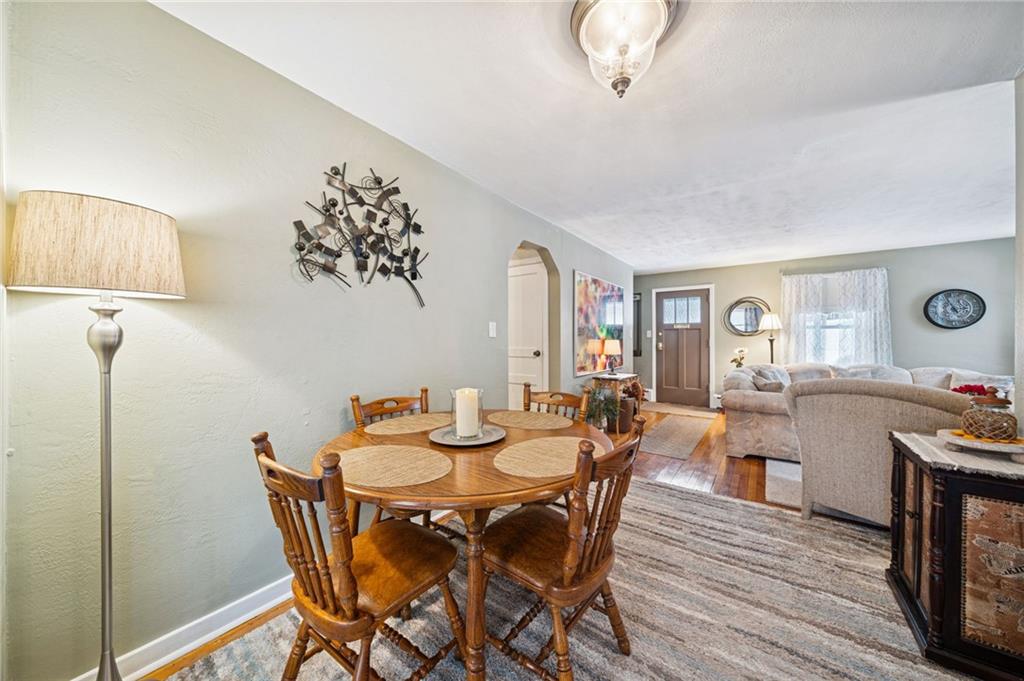 31 Locust Lane Pittsburgh, PA 15241 - Photo 7 of 35 a view of a dining room with furniture and wooden floor