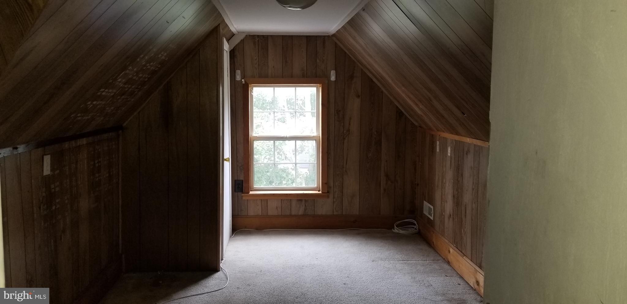 581 Fish Pond Road, Unit UP Glassboro, NJ 08028 - Photo 9 of 10 a view of an empty room with a window