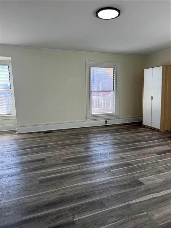94 South 18th Street, Unit 2 Pittsburgh, PA 15203 - Photo 18 of 20 an empty room with wooden floor and windows