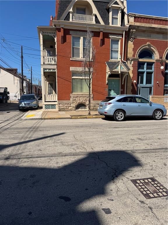 94 South 18th Street, Unit 2 Pittsburgh, PA 15203 - Photo 2 of 20 a front view of a house with parking space