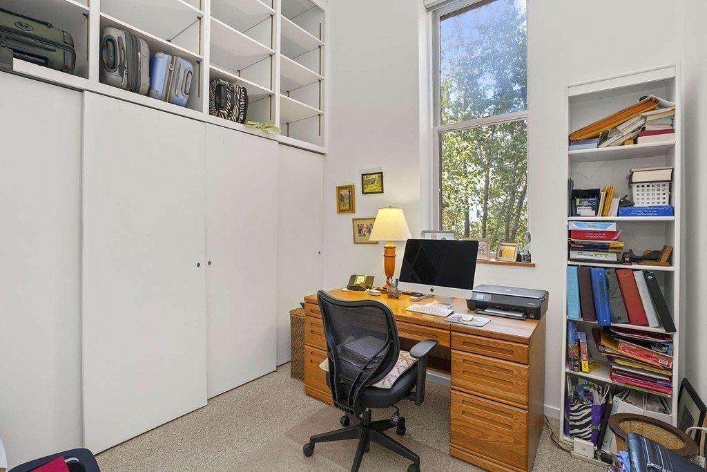 145 St Botolph Street, Unit 21 Boston, MA 02115 - Photo 12 of 23 a view of a workspace with furniture and a window