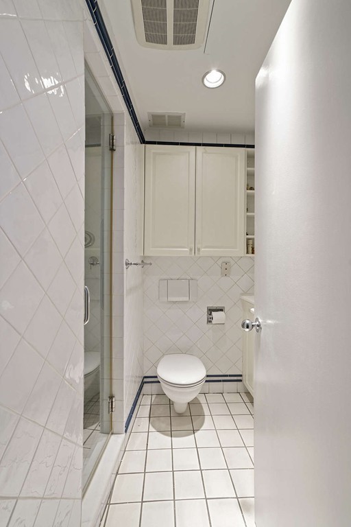 145 St Botolph Street, Unit 21 Boston, MA 02115 - Photo 19 of 23 a bathroom with a sink and a toilet