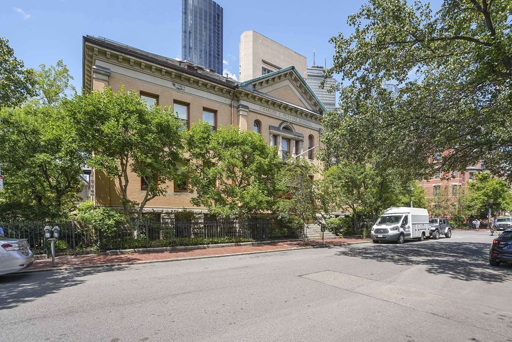 145 St Botolph Street, Unit 21 Boston, MA 02115 - Photo 21 of 23 a car parked in front of a house