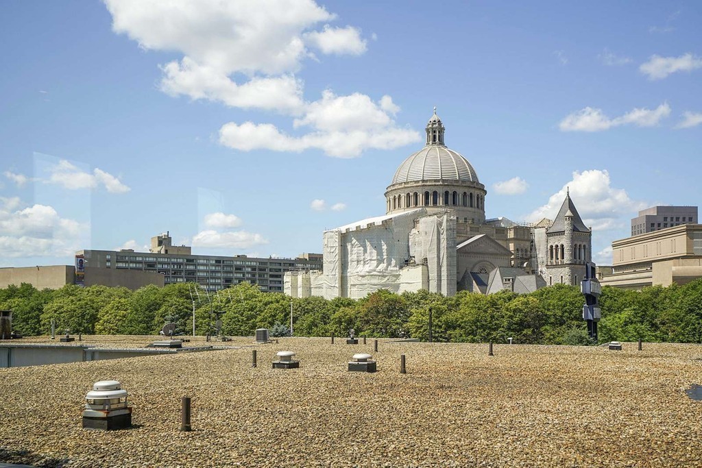 145 St Botolph Street, Unit 21 Boston, MA 02115 - Photo 23 of 23 a front view of a house with a yard