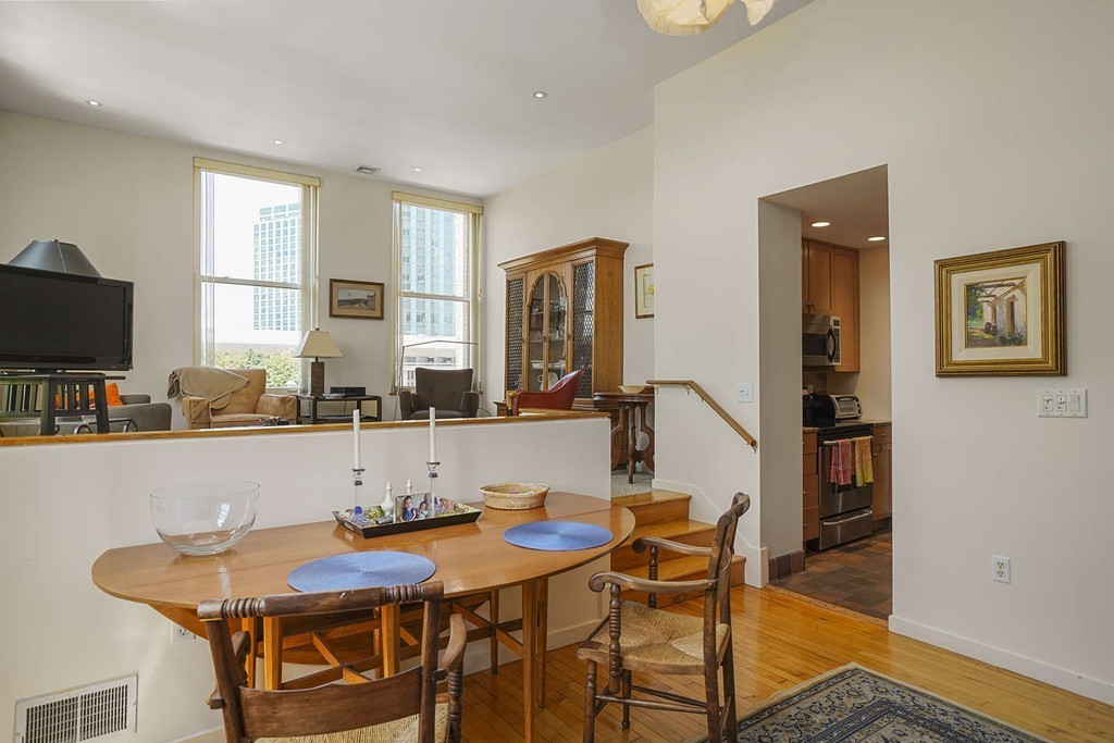 145 St Botolph Street, Unit 21 Boston, MA 02115 - Photo 7 of 23 a view of a dining room with furniture