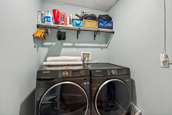 a utility room with dryer and washer