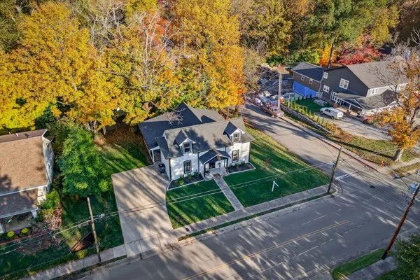 a view of a chairs and table in the patio