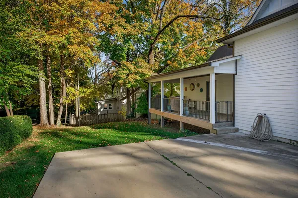 a house with trees in the background