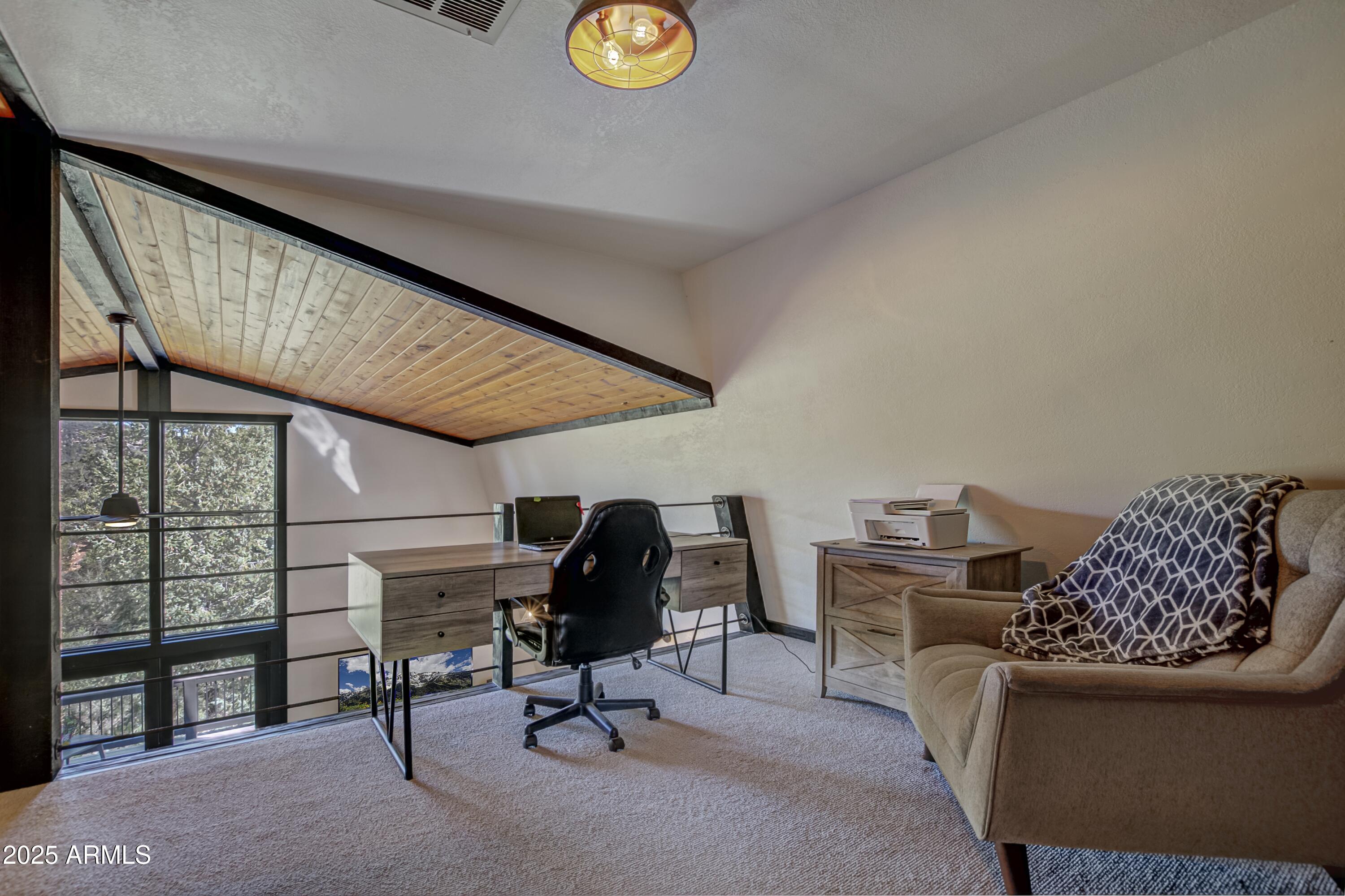 4763 Ernies Road Strawberry, AZ 85544 - Photo 16 of 50 a view of workspace with furniture and window