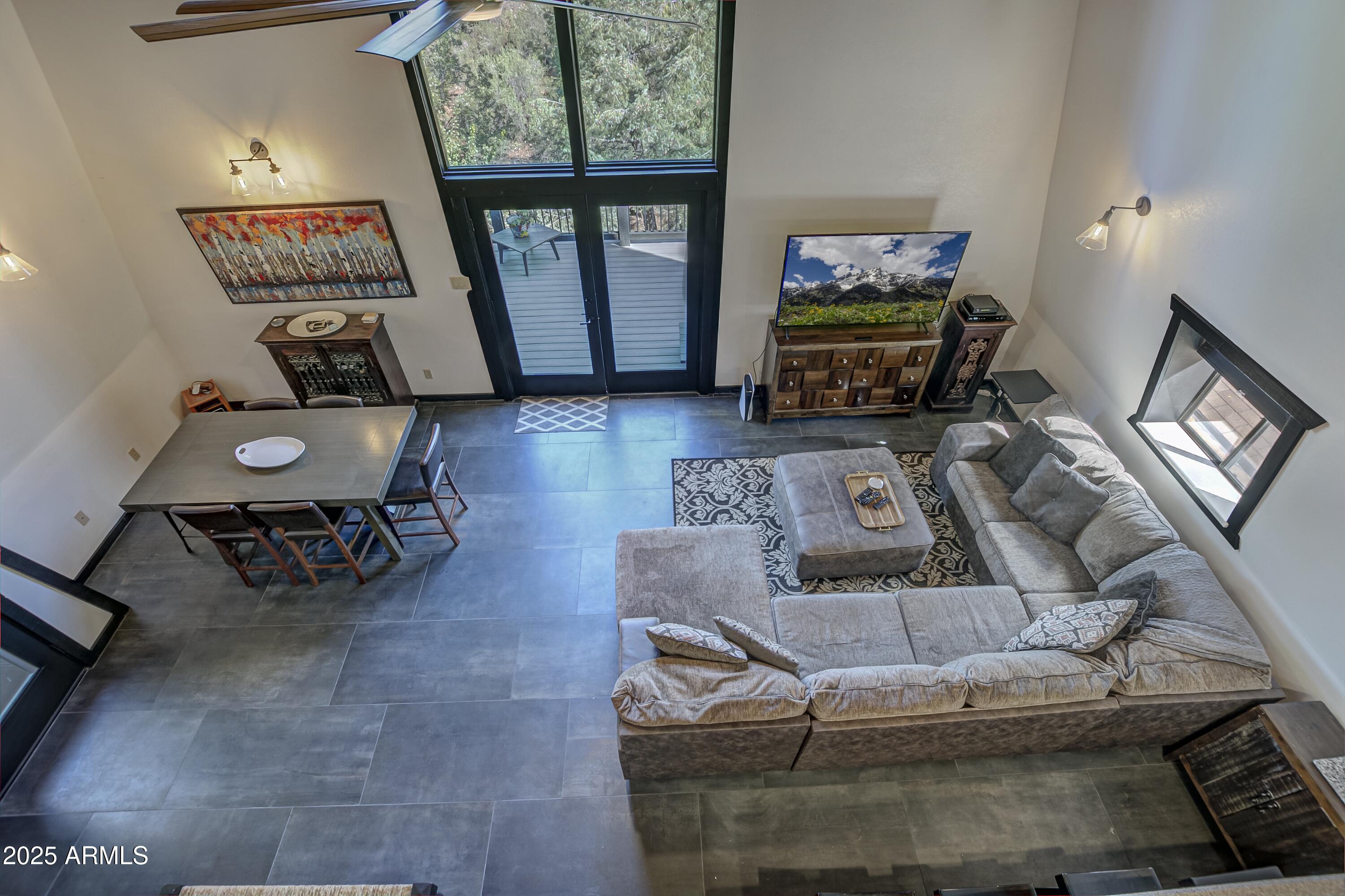 4763 Ernies Road Strawberry, AZ 85544 - Photo 17 of 50 a living room with furniture and a window