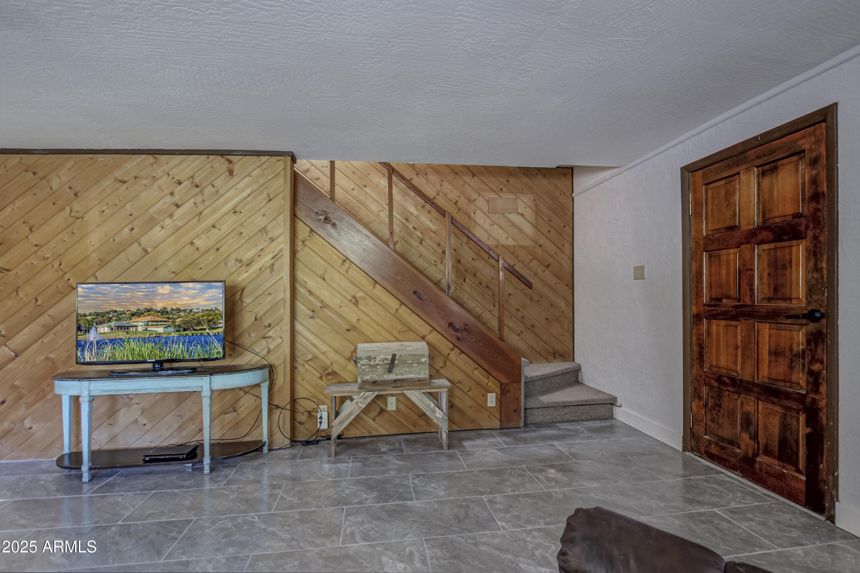 4763 Ernies Road Strawberry, AZ 85544 - Photo 26 of 50 a view of an empty room with stairs
